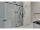 Modern bathroom with glass enclosed shower with white tile, and built-in bench at 3708 Lorraine Ln, Las Vegas, NV 89120