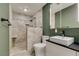 Bathroom featuring single sink, a walk-in shower with seat, and a neutral color palette at 3708 Lorraine Ln, Las Vegas, NV 89120
