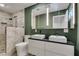 Modern bathroom featuring double sinks, a walk-in shower, and neutral color palette at 3708 Lorraine Ln, Las Vegas, NV 89120