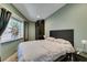 Well-lit bedroom with a comfortable bed and neutral decor, creates a relaxing space at 3708 Lorraine Ln, Las Vegas, NV 89120