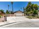 Attractive single-story home featuring a spacious driveway, two-car garage and drought-tolerant desert landscaping at 3708 Lorraine Ln, Las Vegas, NV 89120