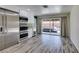 Kitchen area with stainless steel appliances and sliding door access to backyard at 3708 Lorraine Ln, Las Vegas, NV 89120