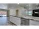 Kitchen with granite countertops, island, and modern appliances at 3708 Lorraine Ln, Las Vegas, NV 89120