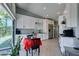 Bright kitchen boasts granite counters, white cabinets, and outdoor access at 3708 Lorraine Ln, Las Vegas, NV 89120