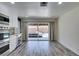 Kitchen area showing stainless appliances and sliding door access to the pool and backyard at 3708 Lorraine Ln, Las Vegas, NV 89120