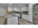 Modern kitchen with granite countertops, stainless steel appliances, and ample storage at 3708 Lorraine Ln, Las Vegas, NV 89120