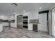Bright kitchen with stainless steel appliances, wine cooler, and access to the patio at 3708 Lorraine Ln, Las Vegas, NV 89120