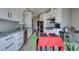 Modern kitchen boasts white cabinets, stainless steel appliances, and granite countertops at 3708 Lorraine Ln, Las Vegas, NV 89120