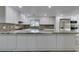 Bright kitchen featuring stainless appliances, marble countertop, and white cabinets at 3708 Lorraine Ln, Las Vegas, NV 89120