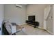 Neutral living room with a modern media console and a comfortable reclining couch at 3708 Lorraine Ln, Las Vegas, NV 89120