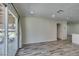 Open concept living space with kitchen view and access to covered patio at 3708 Lorraine Ln, Las Vegas, NV 89120