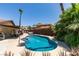 Inviting pool with clear blue water surrounded by lush landscaping, lounge chairs, and a charming patio at 3708 Lorraine Ln, Las Vegas, NV 89120