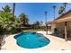 Beautiful pool and patio area with lounge chairs and shade in a large private yard at 3708 Lorraine Ln, Las Vegas, NV 89120