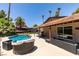 Beautiful backyard featuring a sparkling pool, spa, lush landscaping, and a covered patio perfect for relaxation at 3708 Lorraine Ln, Las Vegas, NV 89120