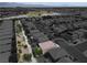 A high aerial view shows a single-Gathering home highlighted in a residential neighborhood in Las Vegas, Nevada at 4036 W Bird Man Ln, North Las Vegas, NV 89084