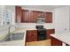 Functional kitchen featuring a stainless steel oven and ample cabinet space at 4036 W Bird Man Ln, North Las Vegas, NV 89084