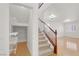 Hallway featuring shelving storage and staircase at 4036 W Bird Man Ln, North Las Vegas, NV 89084