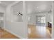 Bright living room with shuttered windows, concrete floors, and an open design at 4036 W Bird Man Ln, North Las Vegas, NV 89084