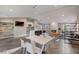 Large clubhouse with a modern kitchen, dining space, fireplace, and comfortable seating area at 4200 S Valley View Blvd # 1035, Las Vegas, NV 89103