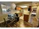 Bright dining area with modern table and chairs, adjacent to kitchen at 4200 S Valley View Blvd # 1035, Las Vegas, NV 89103