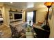 Inviting living room featuring stylish seating, glass tables, and outdoor access at 4200 S Valley View Blvd # 1035, Las Vegas, NV 89103