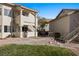 Inviting condo complex featuring well-maintained landscaping and neutral-toned buildings at 433 Mesa Blvd # 201, Mesquite, NV 89027