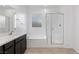 Bathroom featuring a combined tub and shower with glass doors at 4348 Bayley Skye Ave, Las Vegas, NV 89141