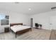 Bright bedroom with carpet floors, natural light, and space for both rest and work at 4348 Bayley Skye Ave, Las Vegas, NV 89141