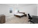 Bedroom with neutral carpet, two windows, and a comfortable bed at 4348 Bayley Skye Ave, Las Vegas, NV 89141