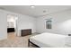 Bedroom with neutral carpet and adjacent bathroom at 4348 Bayley Skye Ave, Las Vegas, NV 89141