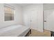 Simple bedroom with carpet, natural light, and closet storage at 4348 Bayley Skye Ave, Las Vegas, NV 89141