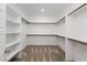 Walk-in closet with ample shelving and storage space at 4348 Bayley Skye Ave, Las Vegas, NV 89141