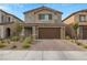 Charming two-story home with a well-maintained front yard and a two car garage at 4348 Bayley Skye Ave, Las Vegas, NV 89141