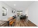 Open living space with wood floors, sliding glass doors, and comfortable seating at 4348 Bayley Skye Ave, Las Vegas, NV 89141