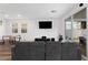 Spacious living room with large windows and sliding glass door for natural light at 4348 Bayley Skye Ave, Las Vegas, NV 89141