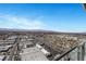 High-rise view of the city, highlighting urban sprawl and distant mountains at 4381 W Flamingo Rd # 3221, Las Vegas, NV 89103