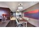 Contemporary kitchen featuring a large island with seating and stainless steel appliances at 4381 W Flamingo Rd # 3221, Las Vegas, NV 89103