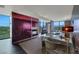 Bright living room with fireplace, comfortable seating, and views of the city skyline at 4381 W Flamingo Rd # 3221, Las Vegas, NV 89103