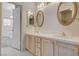 Bathroom with a double sink vanity and decorative mirrors at 439 Columbia Ct, Boulder City, NV 89005
