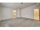 Spacious bedroom with neutral carpet and a view to an ensuite bathroom at 439 Columbia Ct, Boulder City, NV 89005