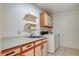 Well-equipped laundry room with ample counter space and storage cabinets at 439 Columbia Ct, Boulder City, NV 89005