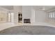 Bright and airy living room with tile floors, fireplace, and seamless flow to other rooms at 439 Columbia Ct, Boulder City, NV 89005