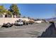 Spacious parking lot with multiple vehicles and trailers, offering convenient storage and parking solutions at 439 Columbia Ct, Boulder City, NV 89005