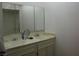 Bathroom featuring a dual sink vanity at 4950 Burnham Ave, Las Vegas, NV 89119
