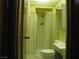 Bathroom features a shower with glass door at 4950 Burnham Ave, Las Vegas, NV 89119
