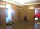 Dining room featuring wood paneling and parquet flooring at 4950 Burnham Ave, Las Vegas, NV 89119