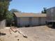 A detached three-car garage offering ample space for vehicles and storage, situated in the backyard at 4950 Burnham Ave, Las Vegas, NV 89119