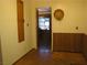 Hallway features wood paneling and parquet flooring at 4950 Burnham Ave, Las Vegas, NV 89119