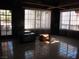 Large living room featuring tile floors and lots of bright sunlight at 4950 Burnham Ave, Las Vegas, NV 89119