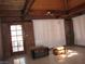 Spacious living room featuring a vaulted ceiling and exposed beams at 4950 Burnham Ave, Las Vegas, NV 89119